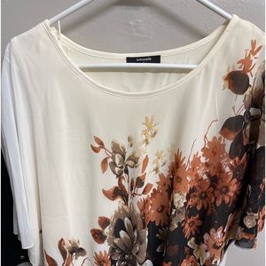Floral print, cream colored base blouse. Size large